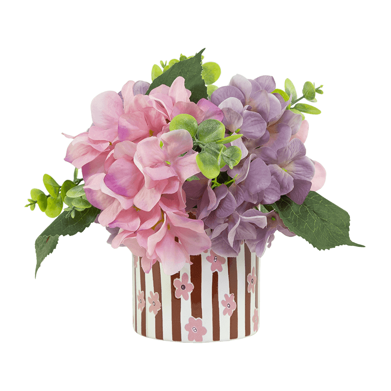 Disposición de hortensias artificiales en maceta cerámica